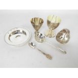 A group of silver and plated items comprising a small Ottoman silver egg cup,