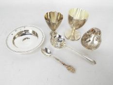 A group of silver and plated items comprising a small Ottoman silver egg cup,