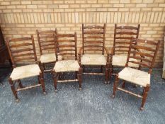 Four ladder back chairs and two carvers.