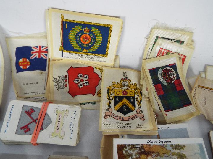 A collection of cigarette cards with a good quantity of silks including Heraldic, Regimental, - Image 6 of 11