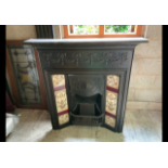 A Victorian cast iron fireplace with tile surround, approximately 177 cm x 104 cm x 16 cm.