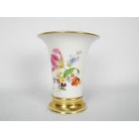 Meissen - A vase of trumpet form with floral decoration and gilt highlights,