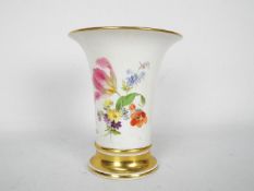 Meissen - A vase of trumpet form with floral decoration and gilt highlights,