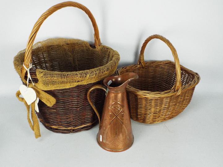 A Joseph Sankey & Sons Art Nouveau copper jug of tapering form with relief decoration,