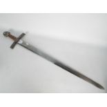 A decorative reproduction sword by Ancient Warrior, approximately 103 cm (l).