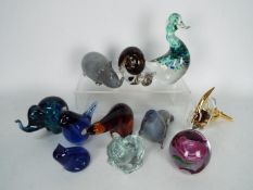 A collection of paperweights, predominantly zoomorphic, to include Wedgwood, Goebel and other.