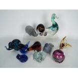 A collection of paperweights, predominantly zoomorphic, to include Wedgwood, Goebel and other.