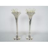 A pair of Victorian silver specimen vases (weighted bases), London assay 1897,