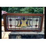 A stained glass window measuring approximately 108 cm x 53 cm.