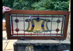 A stained glass window measuring approximately 108 cm x 53 cm.