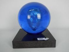 Bertil Vallien for Kosta Boda - Headman Blue sculpture on black marble base, signed to the base,