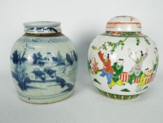 Two Chinese lidded pots, one decorated with with a landscape scene in blue and white,