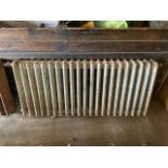 A Victorian, four bar, cast iron radiator,