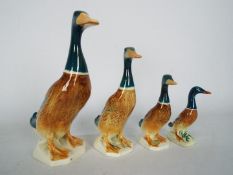 Beswick - A set of four, graduated mallard ducks, largest approximately 17.5 cm (h).