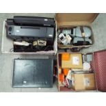 Lot to include a slide projector, slides and accessories, computer equipment and other.