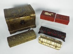 A collection of trinket / small storage boxes.