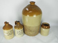 Stoneware group including two T W Parker Warrington flagons and similar,