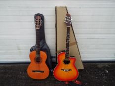 A Tanglewood Odyssey TMO-7NC bowl back electro acoustic guitar (boxed) and a Sierra acoustic guitar