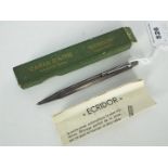 Caran d'Ache - A vintage Ecridor white metal propelling pencil .