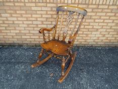 A traditional style rocking chair