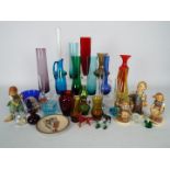 Lot to include coloured glass vases, glass animals four Hummel figurines and a Hummel plate.
