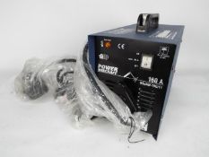 Power Craft - A 160 amp arc welder, model number BX1-160B2, appears unused.