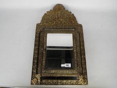 A vintage brass, wall hanging, mirrored small cabinet,