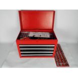 A red metal, four drawer, tool chest with contents.