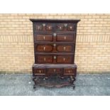 A chest on stand of two over three drawers,