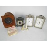 A Selection of clocks to include a Smiths (for restoration) and two Metamec clocks,