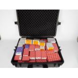 A tool case containing numerous boxes of various Screw Fix screws.