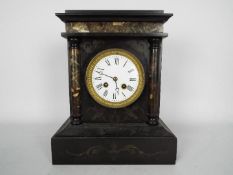 A black slate and marble mantel clock, Roman numerals to a white enamel dial,