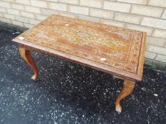 Indian coffee table with inlaid decoration, on cabriole supports,
