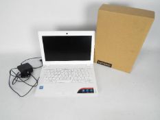A boxed Lenovo laptop.