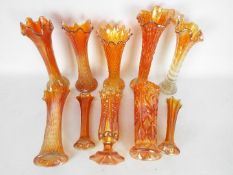 A Selection of Carnival Glass - A large collection of orange Carnival Glass Fluted Vases.