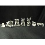 Swarovski style animals to include a frog, a pig, a rabbit, and other.