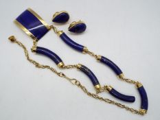 An Egyptian gold and lapis lazuli necklace and earrings set purchased from H Elwan Jewellery