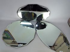 Three vintage wall mirrors, largest approximately 51 cm (d).