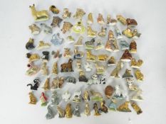 A selection of Wade Whimsies and Wade Whoppers in excess of 60 to include dogs, seals, camels,