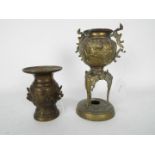 Two cast metal vases, the largest approximately 22 cm (h).