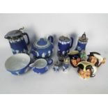 A collection of Wedgwood Jasperware and three small Royal Doulton character jugs.