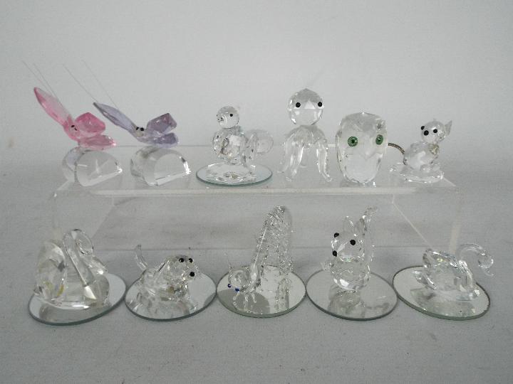 Glass and crystal animals, Swarovski and other, to include butterflies, octopus, swan and similar.