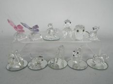 Glass and crystal animals, Swarovski and other, to include butterflies, octopus, swan and similar.