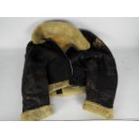 A vintage sheepskin flying jacket.