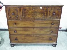 A mahogany secretaire cabinet with fitte