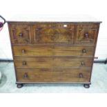 A mahogany secretaire cabinet with fitte