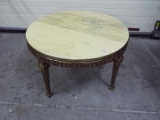 A brass and marble circular topped table