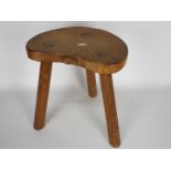 A Robert Mouseman Thompson oak cow stool