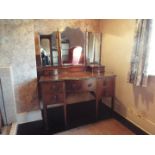 A dressing table with triptych mirror, a