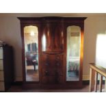 A good quality mahogany triple wardrobe